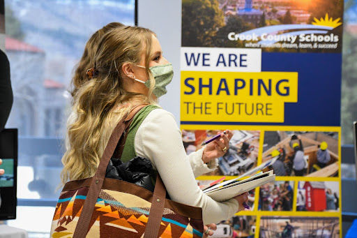 An 米博体育 student meeting with Crook County Schools at a job fair.